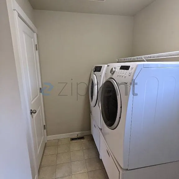 Plenty of storage in laundry room!