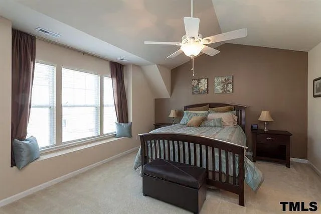 Master bed with vaulted ceiling