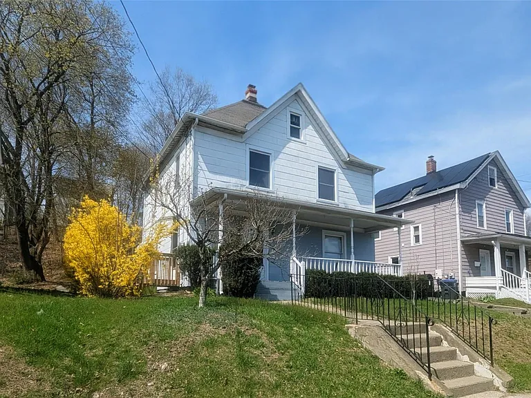 84 Orange Ave — Photo 1
