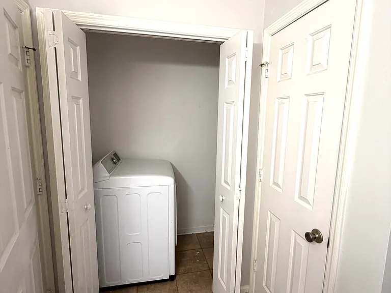 Laundry Closet in Hallway Bathroom