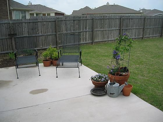 Oversized backyard and patio w/ double gate - plenty of room for boat storage