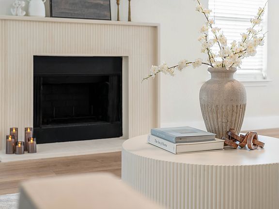 Main living area featuring a gas fireplace.