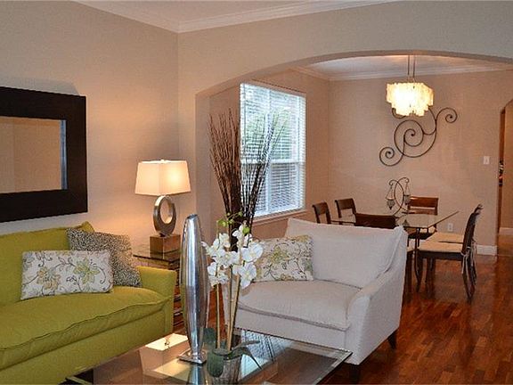 Hardwood floors throughout formal living, dining and family room.