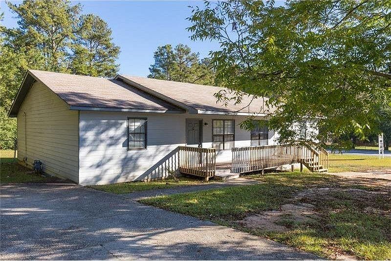 FRONT YARD AND FENCED BACKYARD WITH A HUGE PLAYGROUND FOR FA