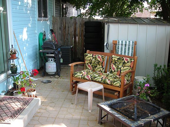 Back patio with storage shed