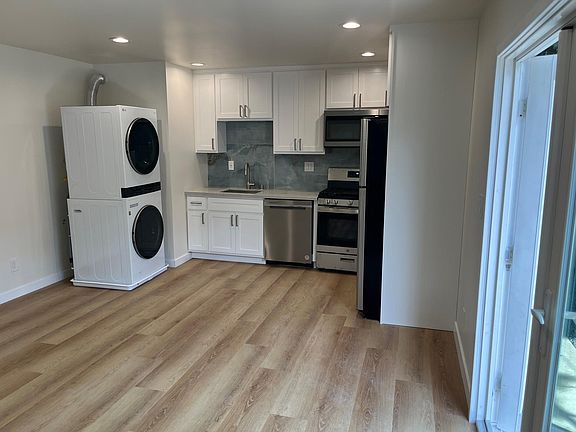 kitchen area with laundry