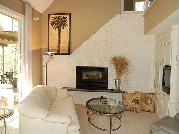 A 2 story Great Room with a wall of windows