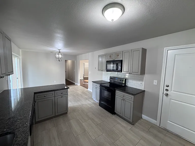 Photo from a previous listing. Tenant is currently occupying the Home.