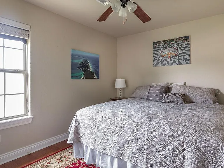 Guest bedroom 2 with king bed.