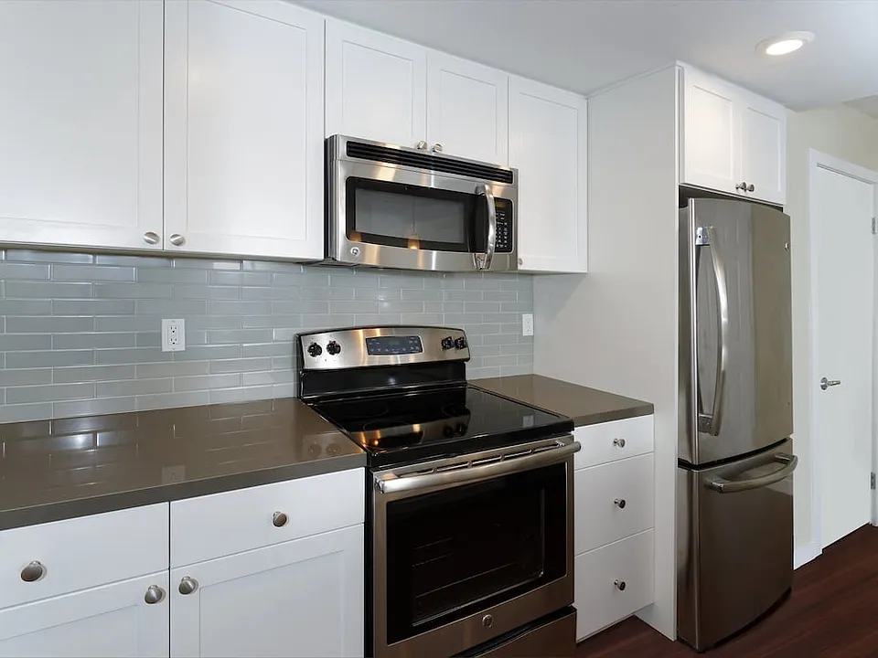 Kitchens With Quartz Countertops Tile Back Splash And Stainless Steel Appliances