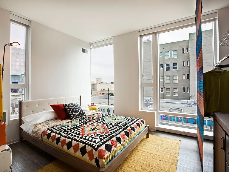 Bedroom with hard surface flooring