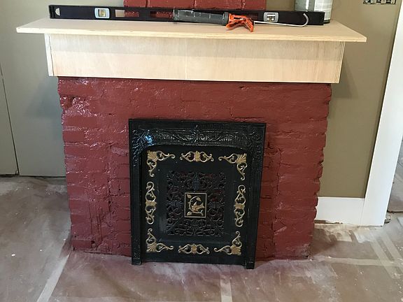 Uncovered in wall fireplace.