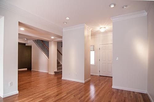 Main Floor Looking to Dining Area and Front Door