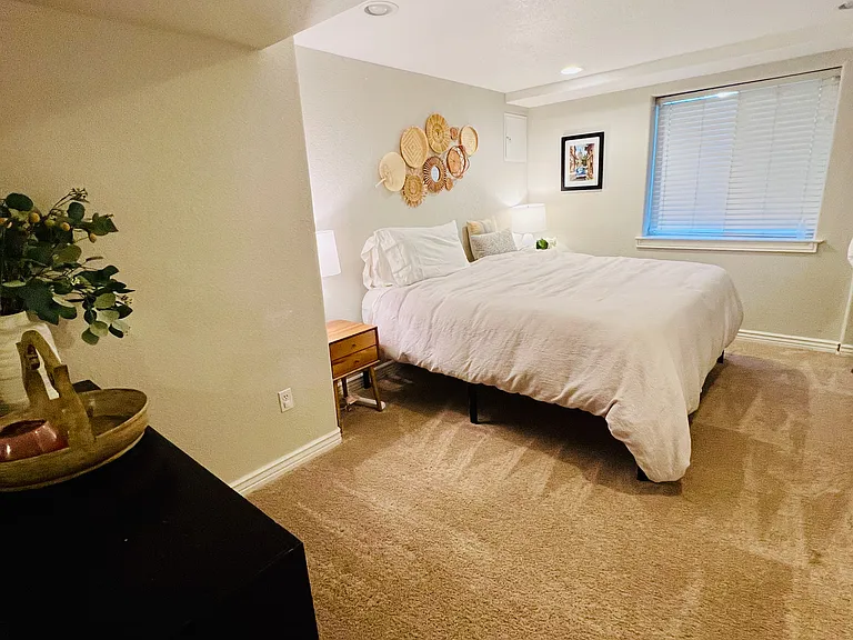 Den in the basement was used as a guest bedroom. Spacious enough to fit a King size bed and furniture.