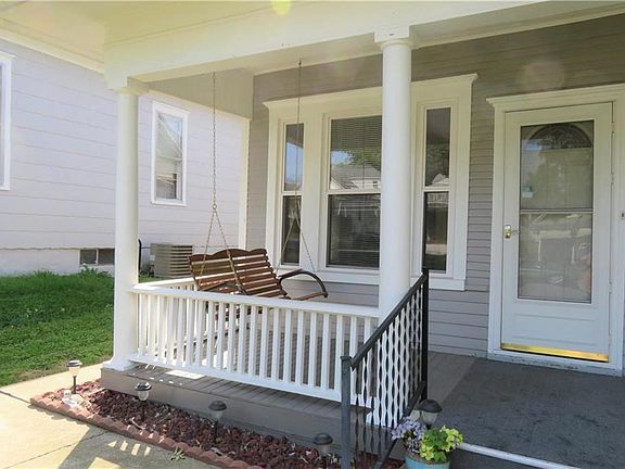 Cozy covered front porch (swing included)