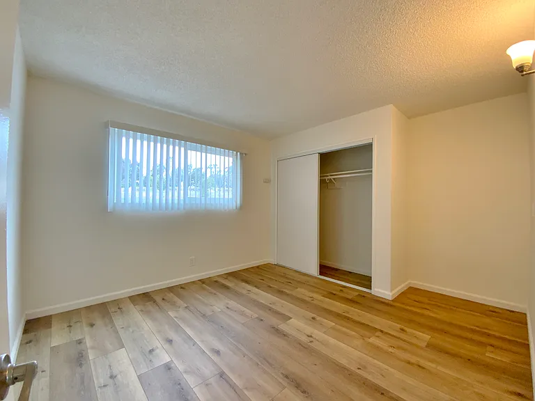Bedroom; Photos of a similar unit. Available unit has luxury vinyl "wood" plank flooring throughout except in the bedroom (high grade Berber carpet).