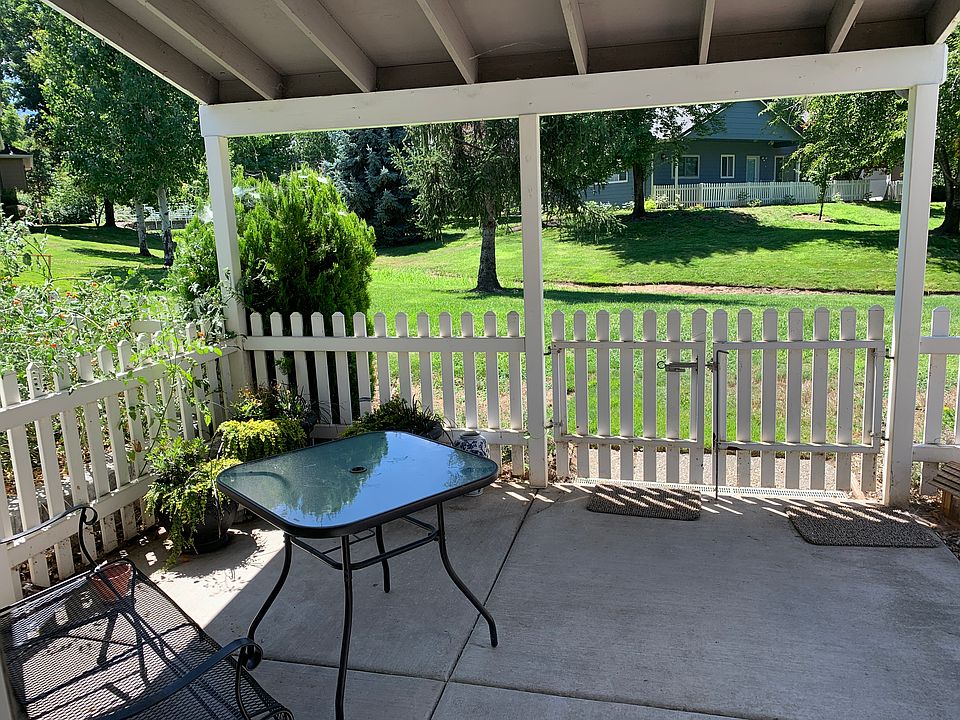 Covered backyard patio seating area