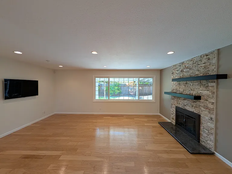 Living room facing towards back yard.
