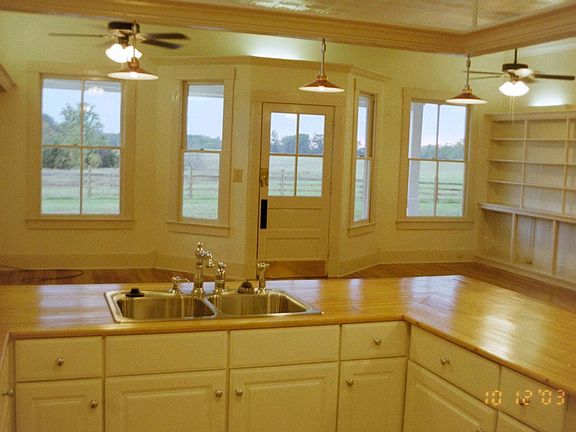 Photo taken from kitchen looking out toward cattle farm.