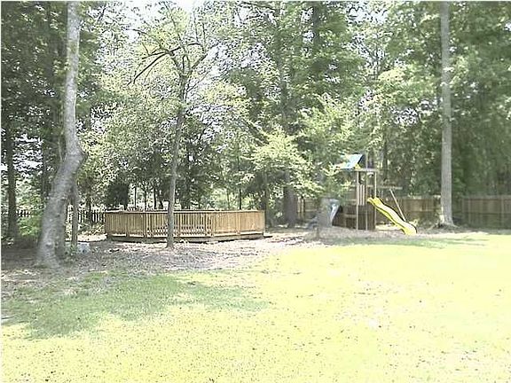 Huge, private back yard, with plenty of alternatives for entertainment.