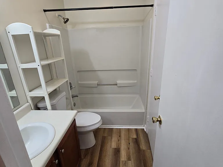 Full Bath that leads to the Spare Bedroom or Hallway for Guest or family use. Each entrence has lockable doors for total privacy and security.