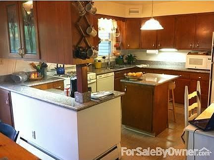 Living room with bay window
						:
						Includes built in bookcases