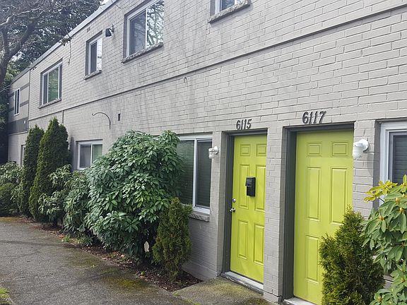 Street level entry with natural plantings.