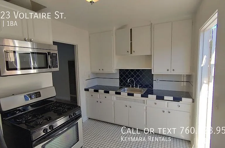 5123 Voltaire St — Photo 9