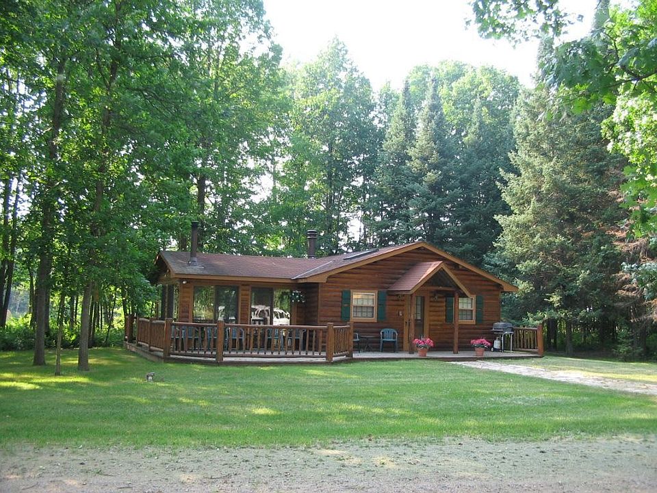 Log sided home on 70 acres