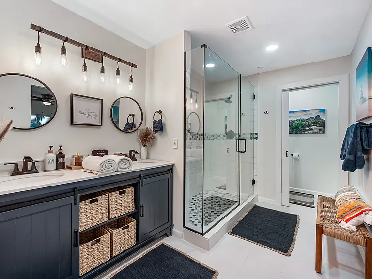 Ensuite to Bedroom #3. Dual sink vanity, walk-in shower, separate toilet
