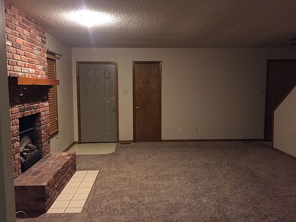 Large Living room with Fire place and Coat closet