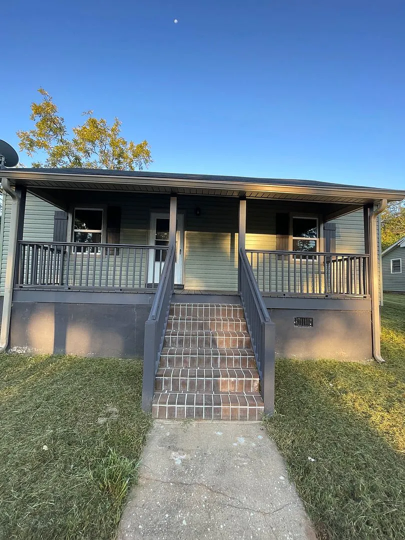 Charming 2-Bedroom Home with Fenced Yard & Classic Character — Photo 1