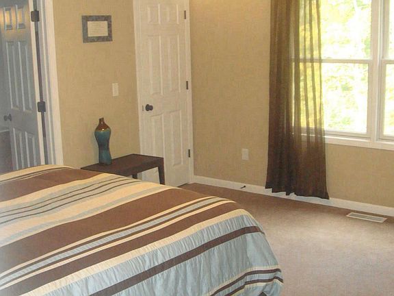 Master Bedroom off Kitchen has 2 Medium Walk in closets w/Ma