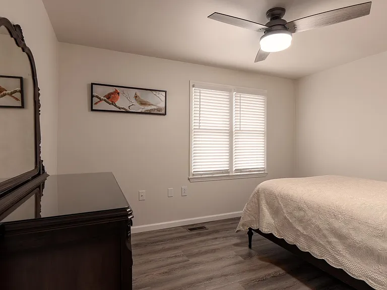 Second Bedroom - windows face back of townhouse. Out of frame on right is walk-in closet.