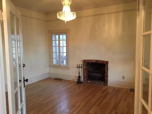 Hardwood floors, fireplaces and more chandeliers