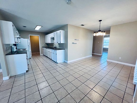 4th image of 15409 Palmira Ave APT A
