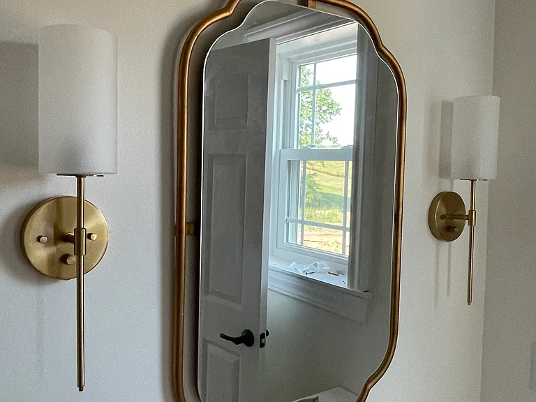 Master bathroom vanity mirror and lighting