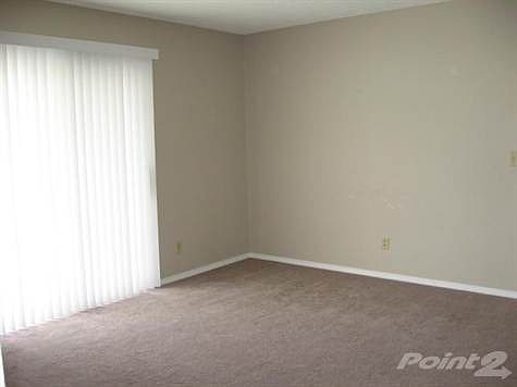 Living w/Patio Doors that Open to Balcony