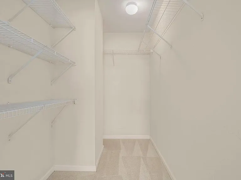 UPPER LEVEL BEDROOM WALK IN CLOSET