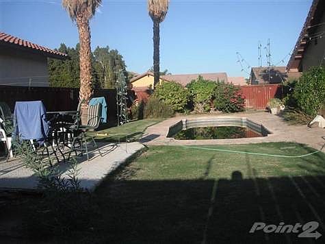 spacious back yard with pool