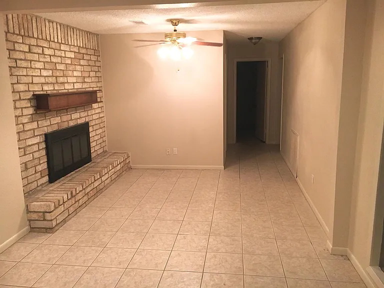 2nd living space leading to back bedrooms and garage
