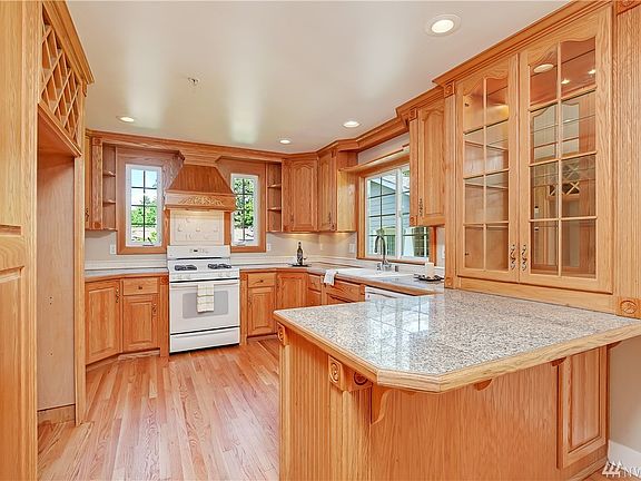 Spacious kitchen with beautiful wood details