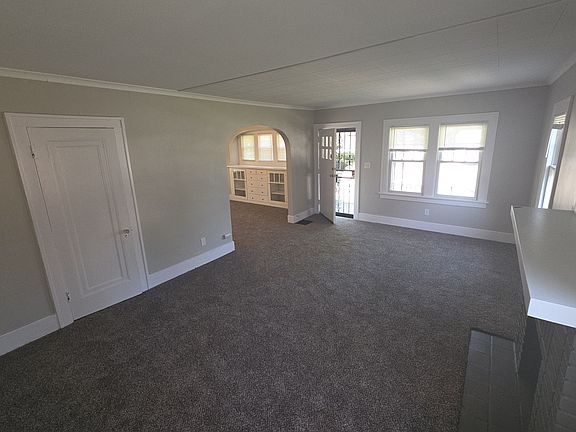 Living room and into the dining room