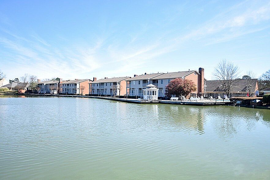 Enjoy the tranquility of lakeside living with these charming townhouses.