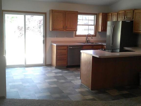 Kitchen walks out to sunny back deck