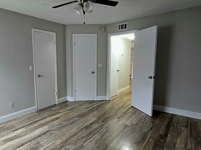 Bedroom 2 with Closet Door and Door to Ensuite/Guest Bath