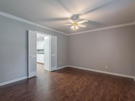 Spacious dining room to your right with easy access to the kitchen!