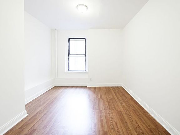 3rd image of 176 E 3rd St APT 2C