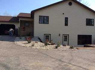 1702 E Gill Rd, Carp Lake, MI 49718