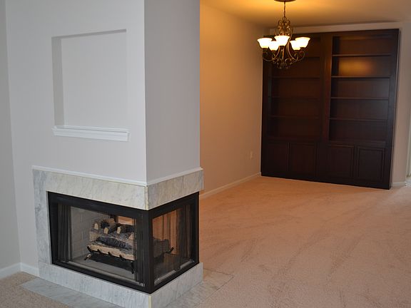 Gas Fireplace looking into Dining Room